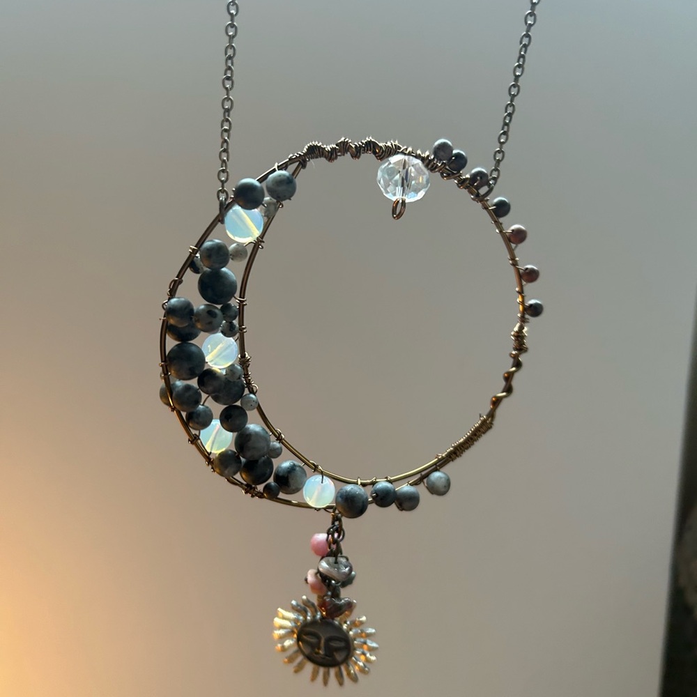 Homemade black jasper crescent moon charm.